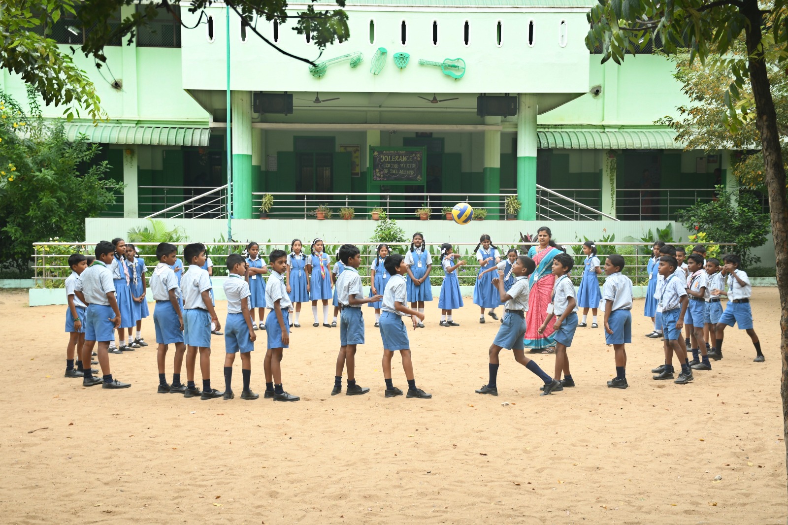 Students playing volleyball